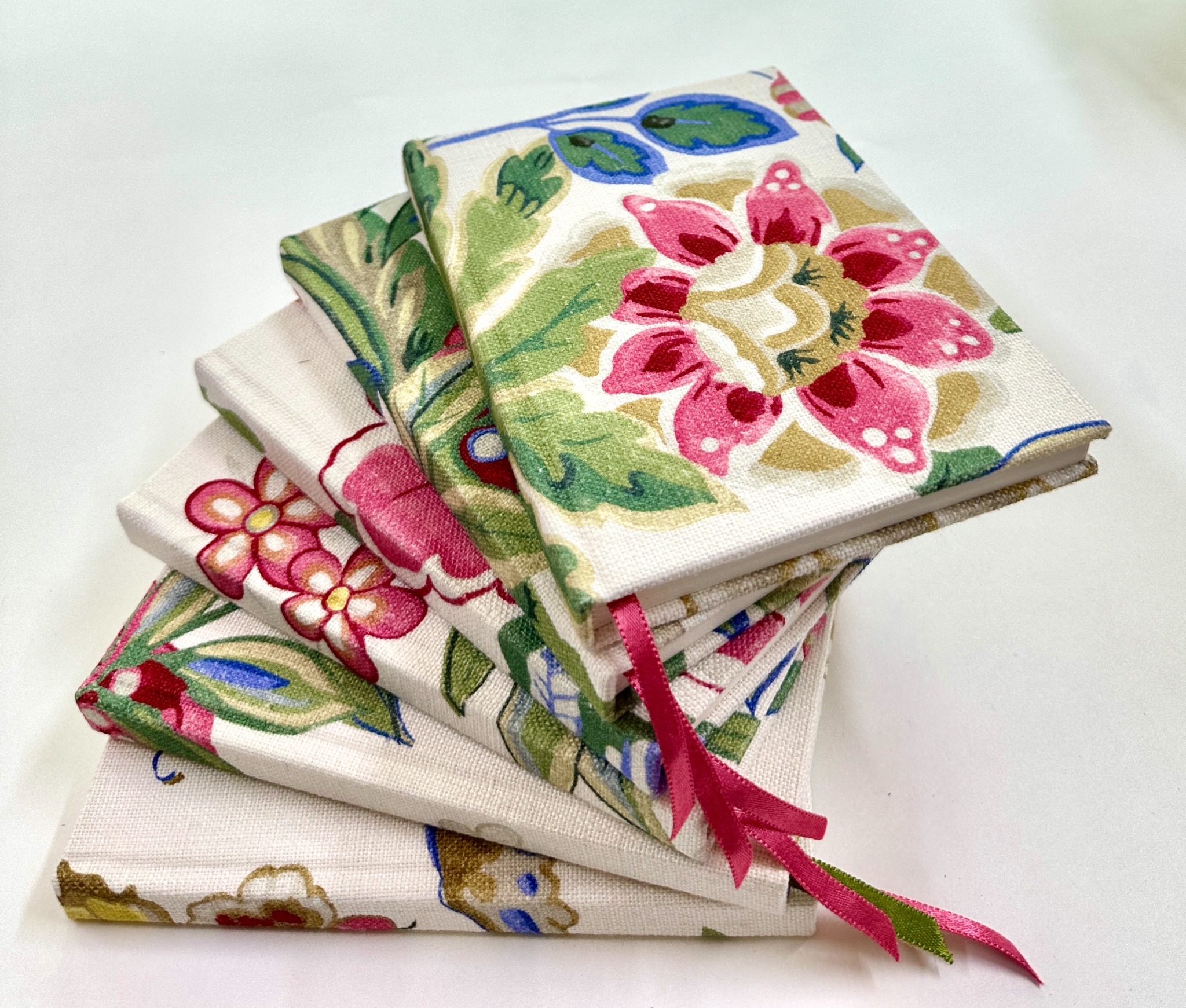 Floral fabric journals with pink and green ribbon markers
