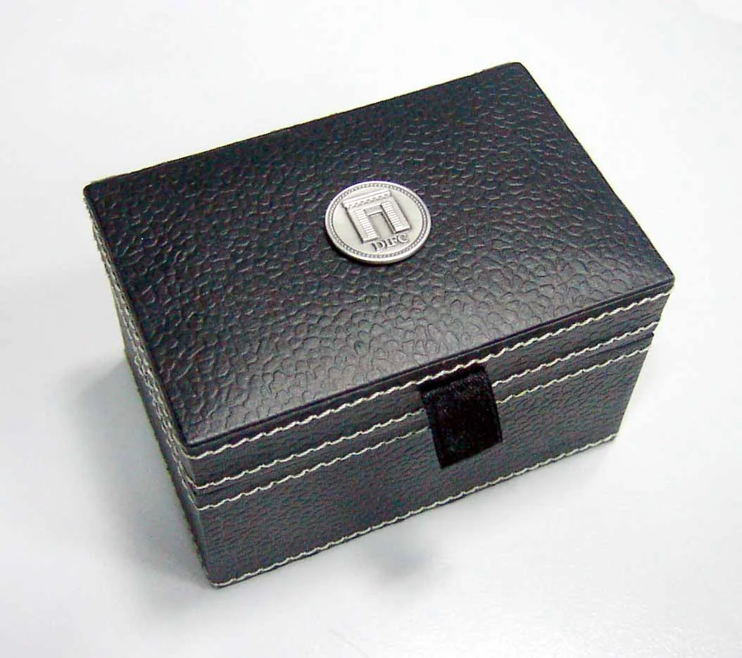 Black textured presentation box with stitched edges
